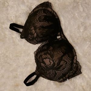 Victoria's Secret plunge push up bra 32DD. Black lace over nude.